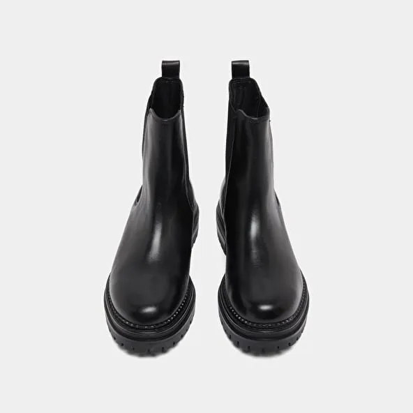 Boots with notched soles and elastic in black leather